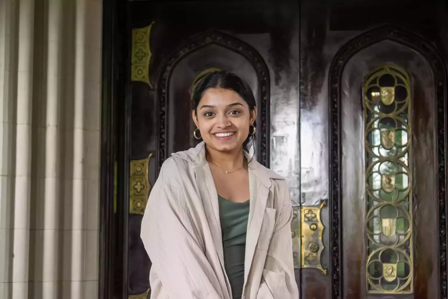 Closeup of me infront of a big brown door